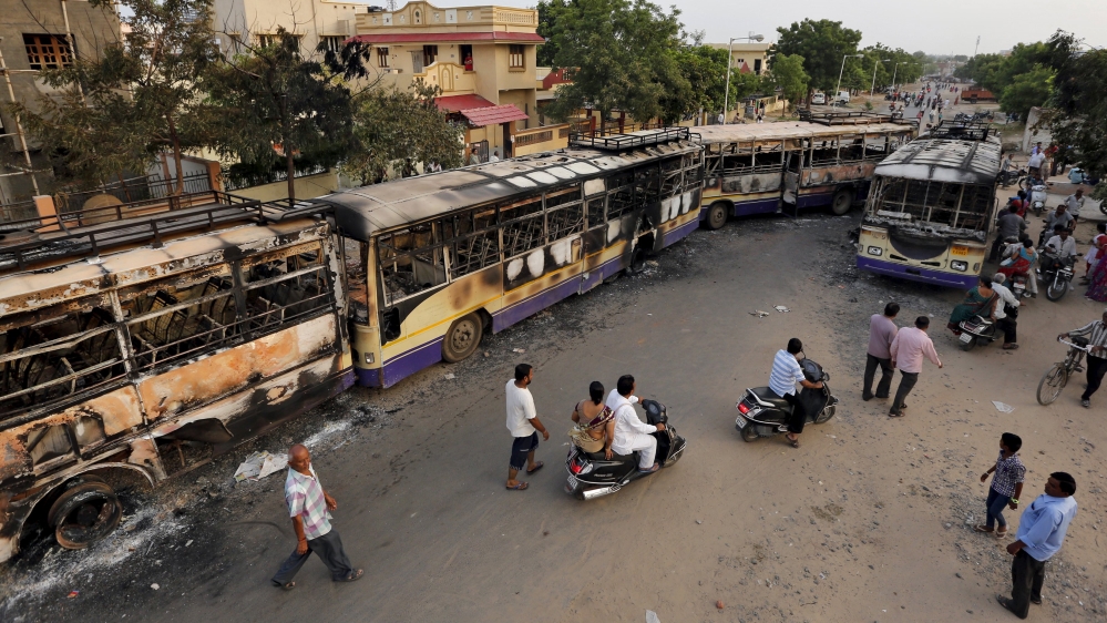
Modi has called for calm in the state that he ran for more than a decade before leading his nationalist Bharatiya Janata Party (BJP) to victory in last year's general election [Reuters]
