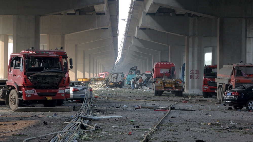 China's National Earthquake Bureau reported two major blasts in Tianjin's industrial zone before midnight on Wednesday [Reuters]