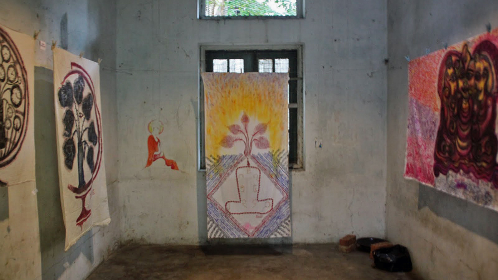 Htein Lin says he grew as an artist while in prison [Mark Fenn/Al Jazeera]