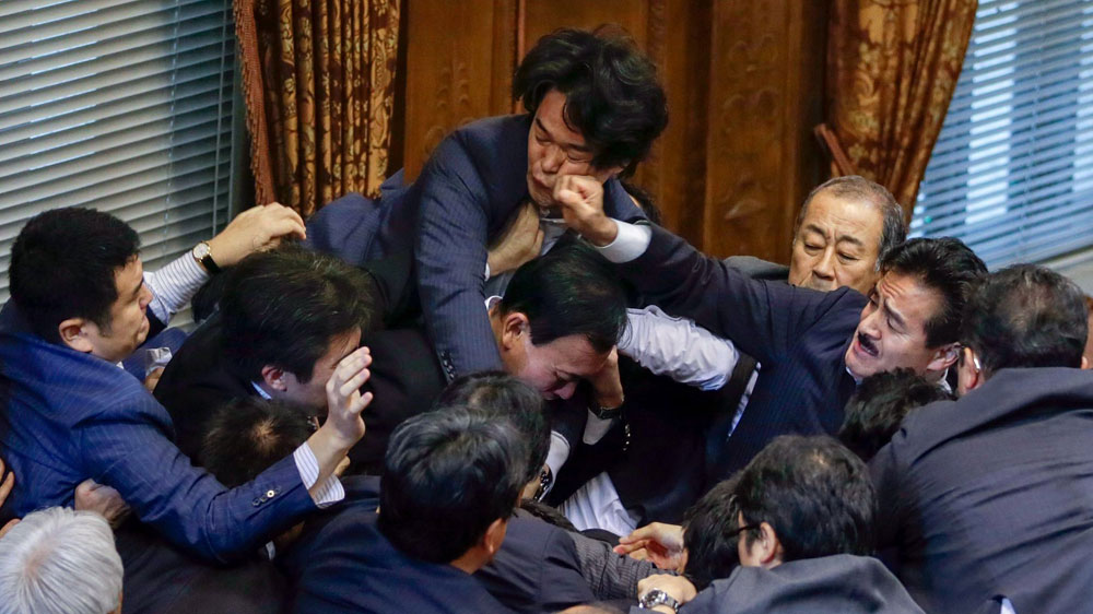 Japan parliament brawl over security bill