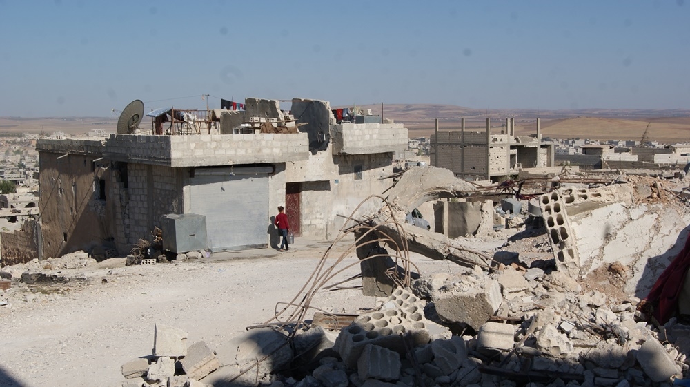  Many houses were damaged or destroyed during the fighting between ISIL and local Kurdish forces [Akhtin Asaad/Al Jazeera]