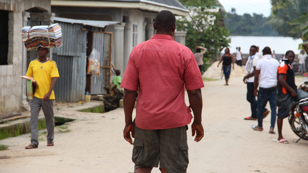 John Gbara's home is near the waterfront in Bodo, a constant reminder of the livelihood he lost [Femke van Zeijl/Al Jazeera]