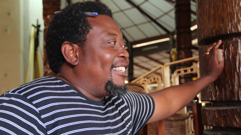 Ashim Nwoko is Demas' son and an artist and builder in his own right [Femke van Zeijl/Al Jazeera]