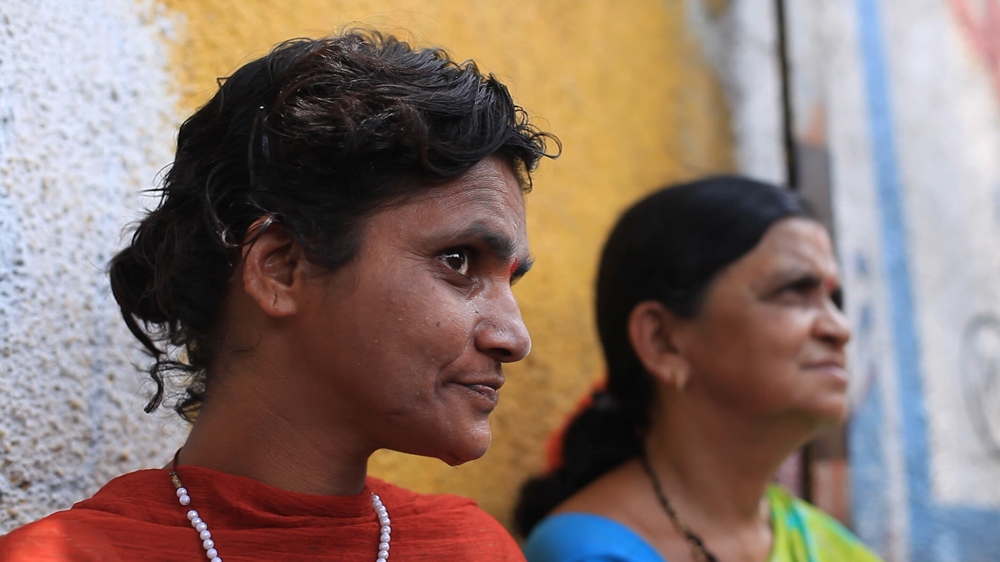 Munda has a network of people in the community making sure she is in good health [Ashima Narain/Al Jazeera]