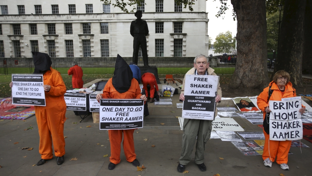 Supporters of Shaker Aamer, the last British prisoner at Guantanamo Bay, demonstrate outside Downing street in central London