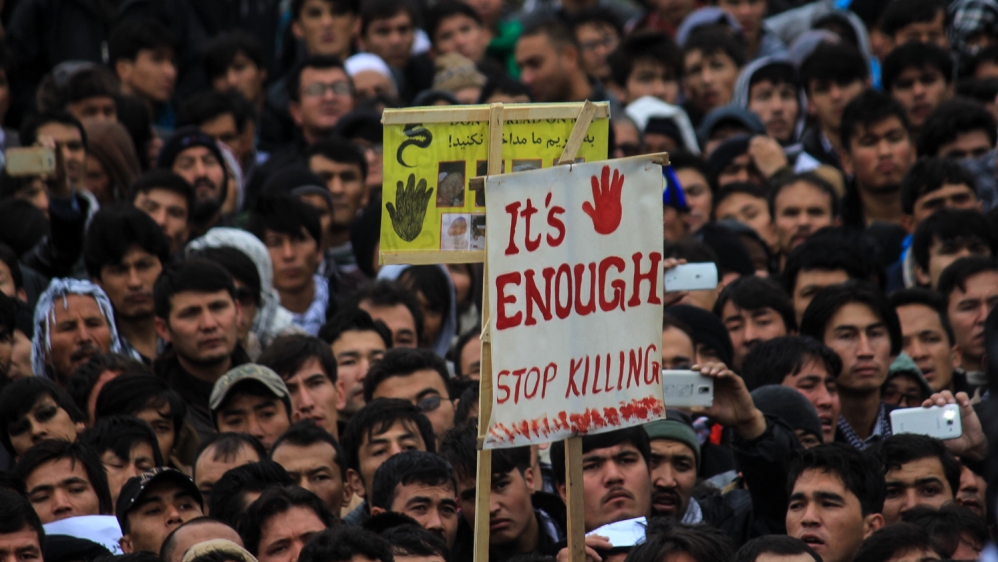 Thousands Afghan gathered protesting against the murder of seven people from the minority Hazara community (Maryam Mehtar/Al Jazeera English)