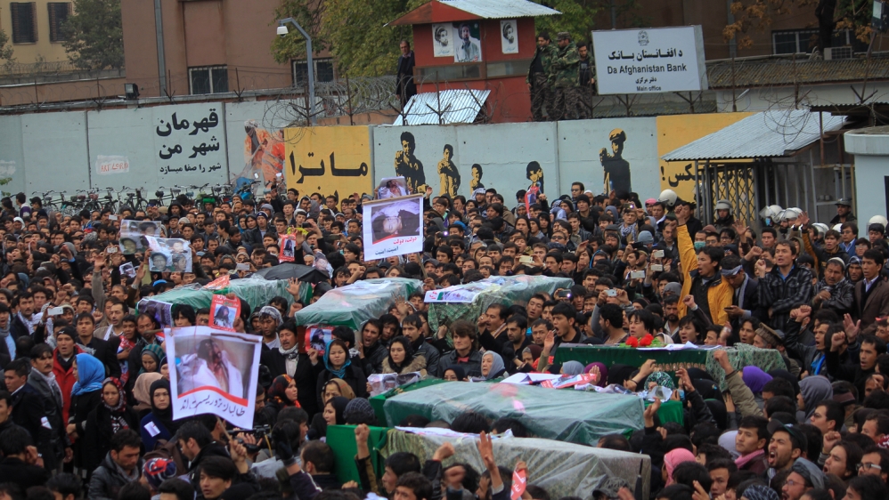 The bodies were transported from Ghazni city to Kabul marching toward the presidential palace (Maryam Mehtar/Al Jazeera English)
