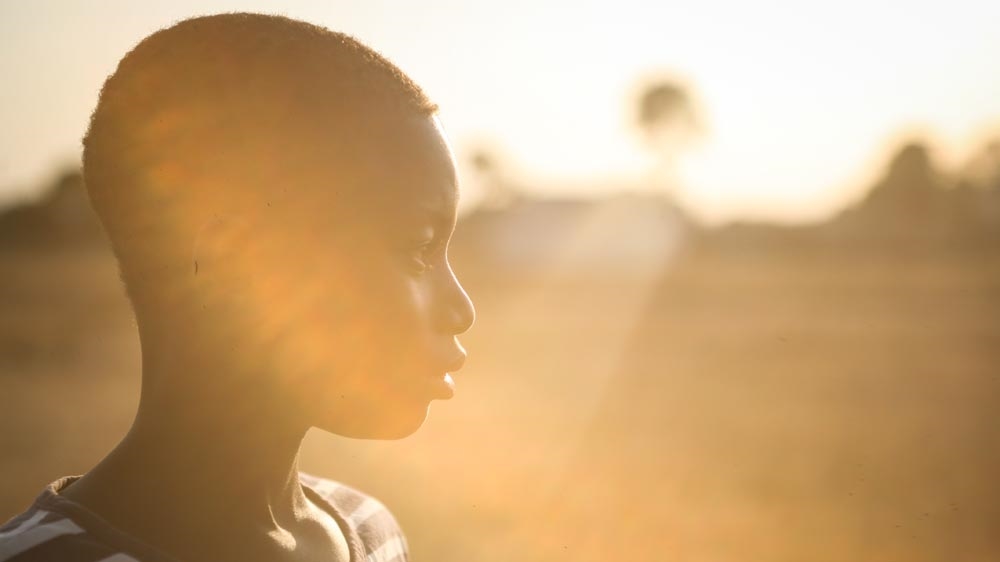 This is the photo Shadrach selected as one of his most meaningful. It was taken during Harmattan, a dry wind that occurs from December to February, and shows one of his friends [Shadrach Adie Amallam/Al Jazeera]