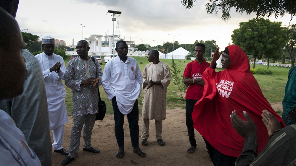 Aisha Yesufu, a Bring Back Our Girls campaigner, speaks at a daily vigil held at the Unity Fountain in Abuja since the kidnapping of the Chibok girls [Caelainn Hogan/Al Jazeera]