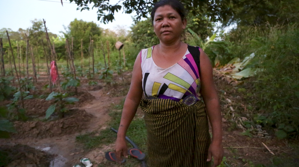 In common with three-quarters of the population of the country, Hla Cho Win has no electricity at home [Ted Regencia/Al Jazeera]