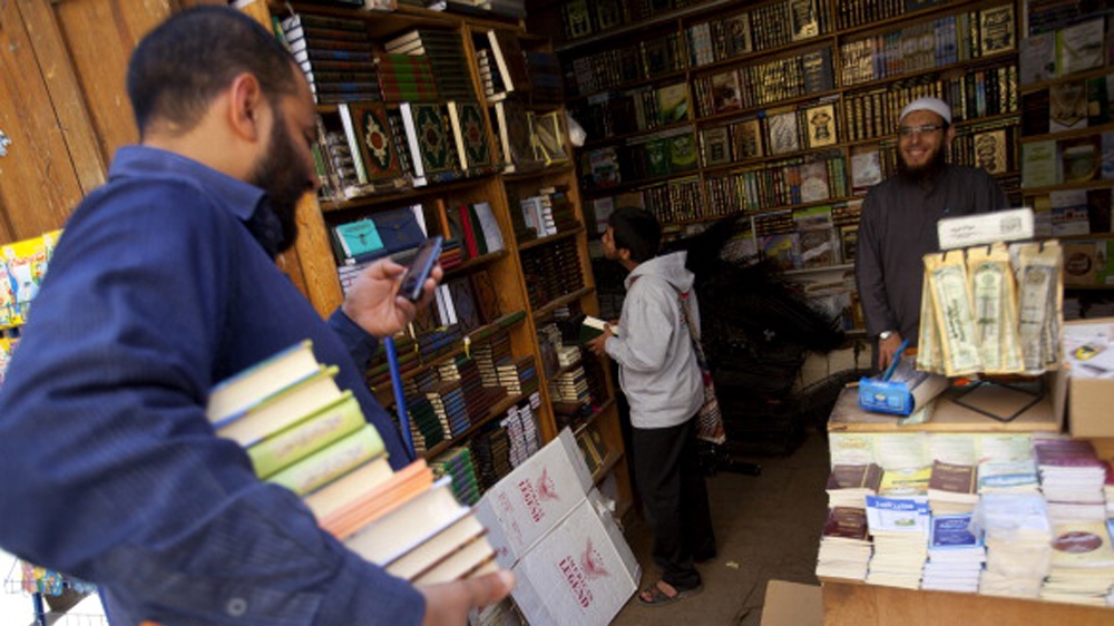 Egyptian select books at a book store in Cairo, Egypt [Getty]