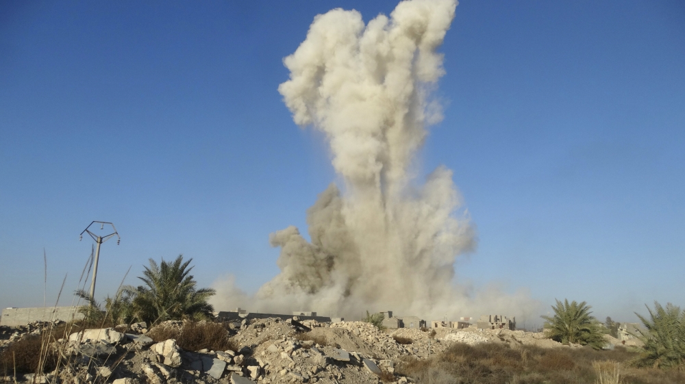 Smoke rises during an air strike in Ramadi city
