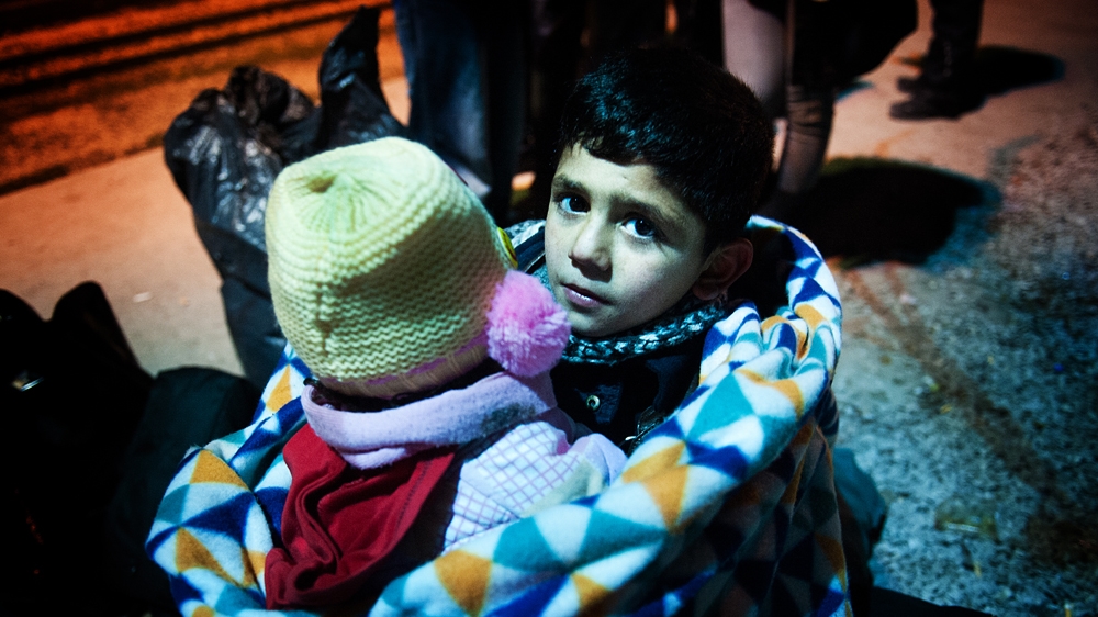Families wait for a train to transport them, but they have no guarantees of when it will come or if it will even come at all [Mona van den Berg/Al Jazeera]