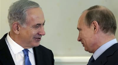 Russian President Vladimir Putin speaks with Israeli Prime Minister Benjamin Netanyahu during their meeting at the Black Sea resort of Sochi, Russia [AP]