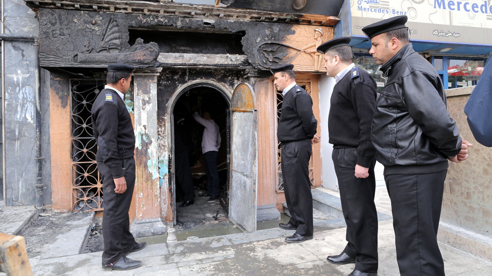 Multiple attackers reportedly threw petrol bombs at the nightclub in the plush quarter of Agouza, causing a fire [Khaled Elfiqi/EPA]
