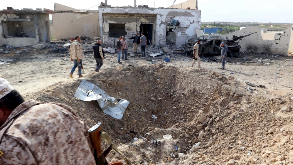 A view shows damage at the scene of an explosion the Mislattah checkpoint near Khoms