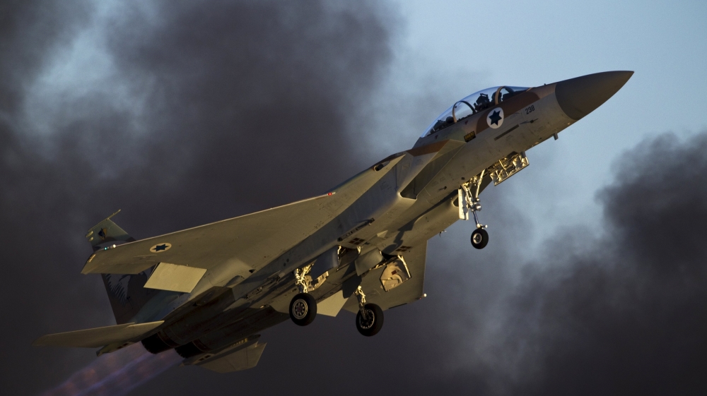 An Israeli air force F-15 fighter jet flies during an exhibition at Hatzerim air base in southern Israel