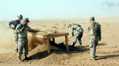 Pictures that arose from the Gulf War only captured the surface of the conflict, like this one of recovery efforts at a crash site in Anbar province on January 17, 1991 [Photo by US Marine Corps & US Navy/Getty]