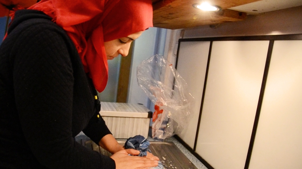 After a relative in Syria gave him a recipe to make cheese, Rami and his wife Hanaa transformed their kitchen into a dairy laboratory [Kait Bolongaro/Al Jazeera] 