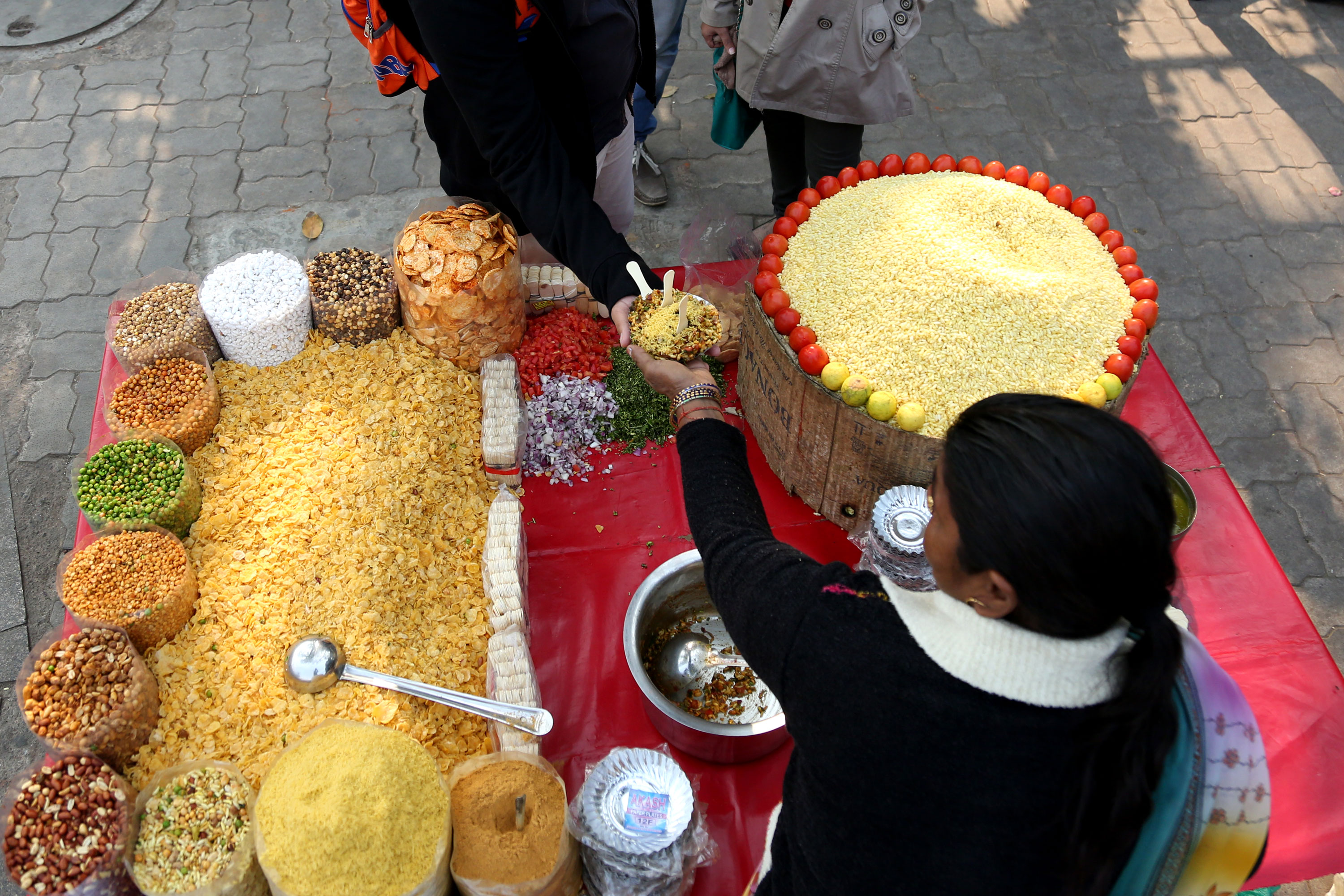 Street vendors Delhi India [Showkat Shafi/Al Jazeera]