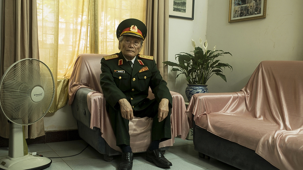 Eight-eight-year-old Trung Tuong Pham Hong cu served as a vice political commissariat of his regiment during the Dien Bien Phu battle. His brother, who also fought in the battle, was killed a few days before the Viet Minh victory [Vincenzo Floramo/Al Jazeera] 
