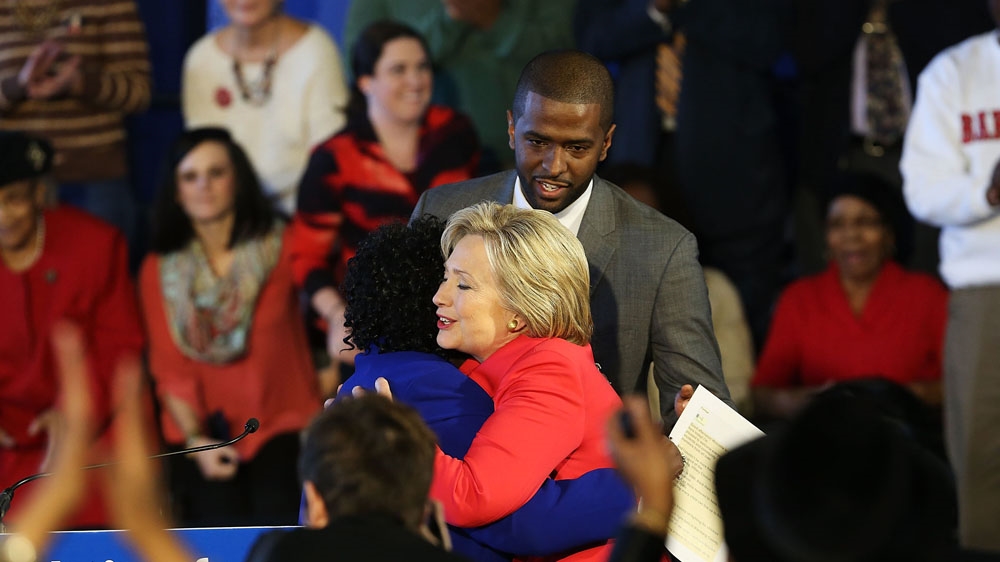 Hillary Clinton greets District Superintendent Dr Thelma Sojourner before speaking to voters in South Carolina a day after her debate with Bernie Sanders [Spencer Platt/Getty Images]