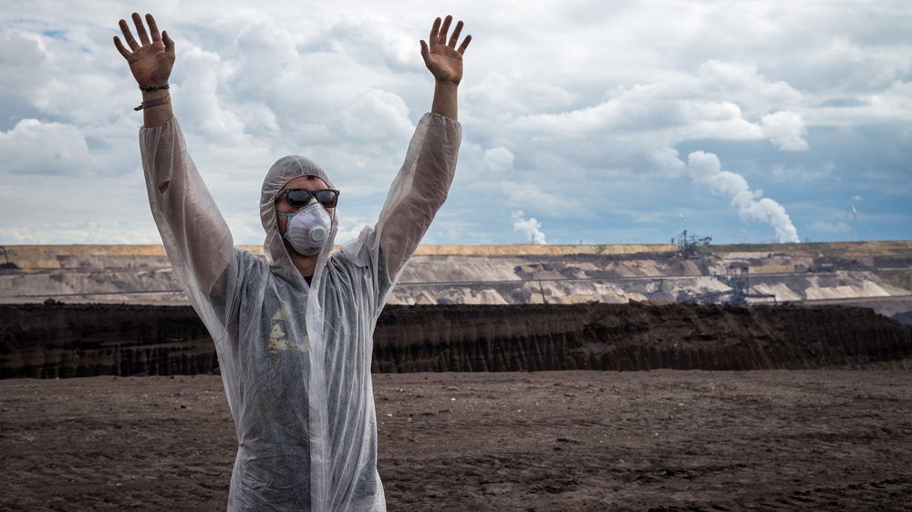 'After breaking through the police line, we begin to pull back together. Those of us who can see lead those blinded by pepper spray' [350.0rg]