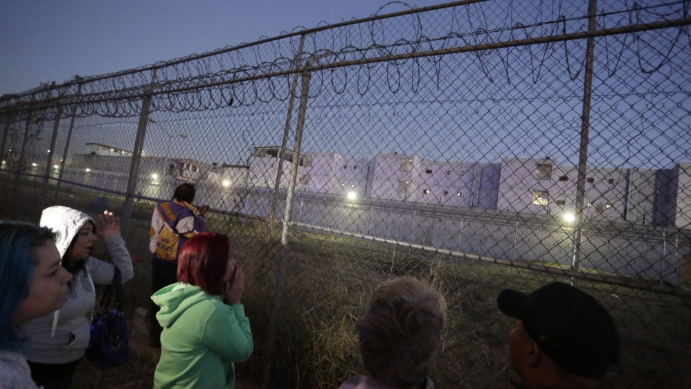 Relatives of prisoners rushed to the scene following reports of deaths [Daniel Becerril/Reuters]