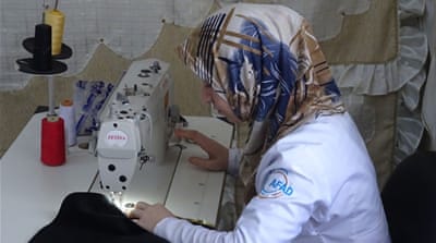 A Syrian refugee from Idlib works in sowing at the AFAD Oncupinar refugee camp at the Bab al-Salam border crossing near Kilis, Turkey [Seth J Frantzman/Al Jazeera]