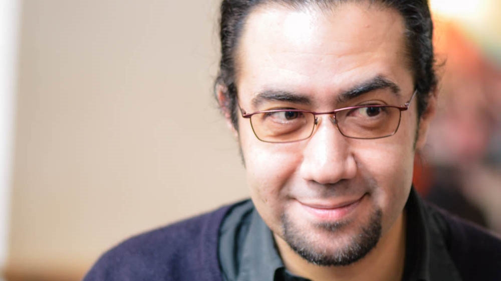 Monis says he likes everything about Berlin and used to feel like a stranger in Damascus [Adrien Le Coarer/Al Jazeera ]