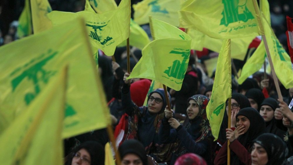 Supporters of Lebanon''s Hezbollah leader Sayyed Hassan Nasrallah wav