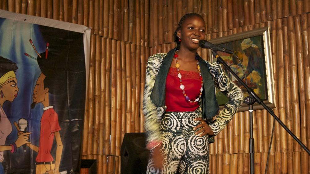 Nigerian poets Wole Soyinka and John Pepper Clark inspire Oyinkansola [Caelainn Hogan/Al Jazeera] 