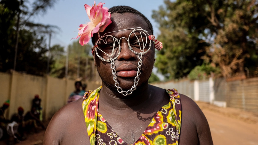 With instruments made from bamboo, plant-based face paints, and skirts woven from local fauna, groups at Guinea Bissau's Carnival dance competition displayed the biodiversity of their country. Teams of performers competed in ceremonial dances from the country's many ethnic groups in a carnival themed Rescue and Promote Our Culture. The dances represented traditional events such as the harvest and coming-of-age ceremonies. [Ricci Shryock/Al Jazeera]