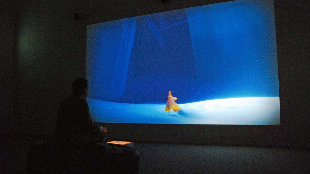  Visitors to the museum can play the game of Jenova Chen at games consoles [Anna Nigmatulina/Al Jazeera]