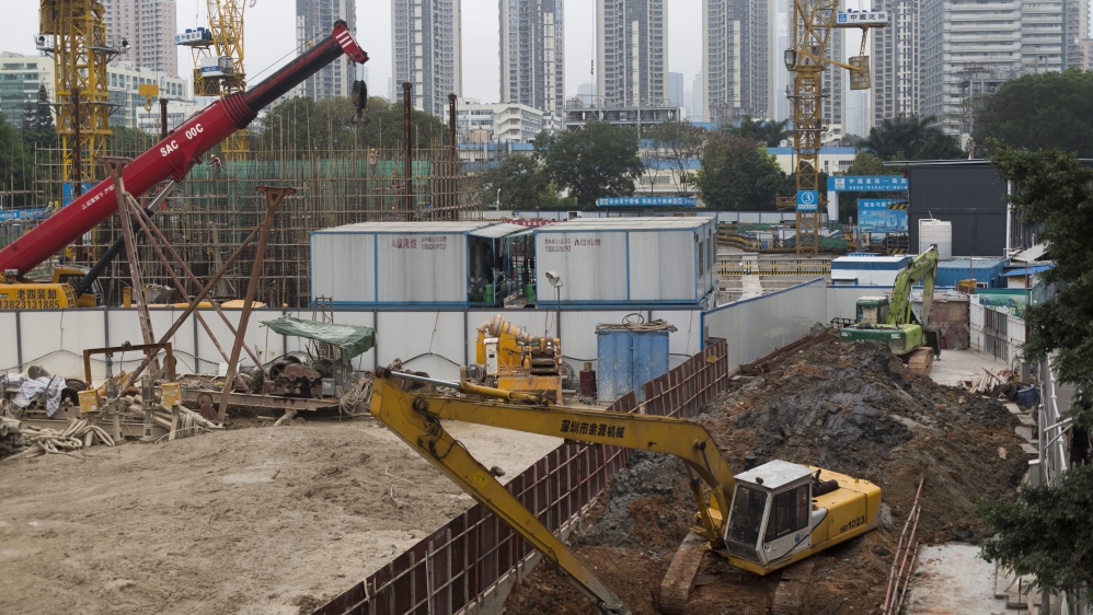 Excavator operates on a construction site