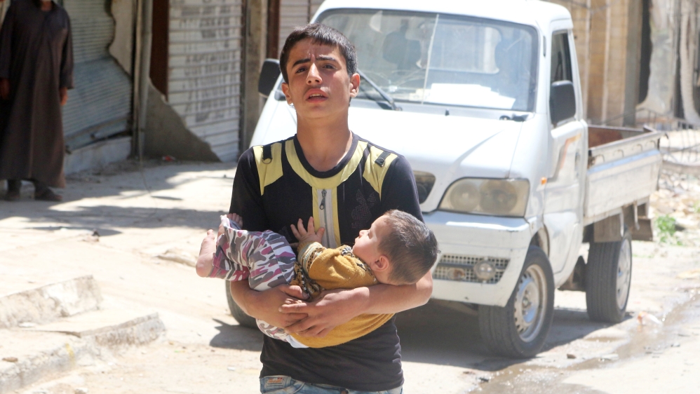 Locals and rescue workers have struggled to evacuate civilians from the sites of air strikes [Abdalrhman Ismail/Reuters]