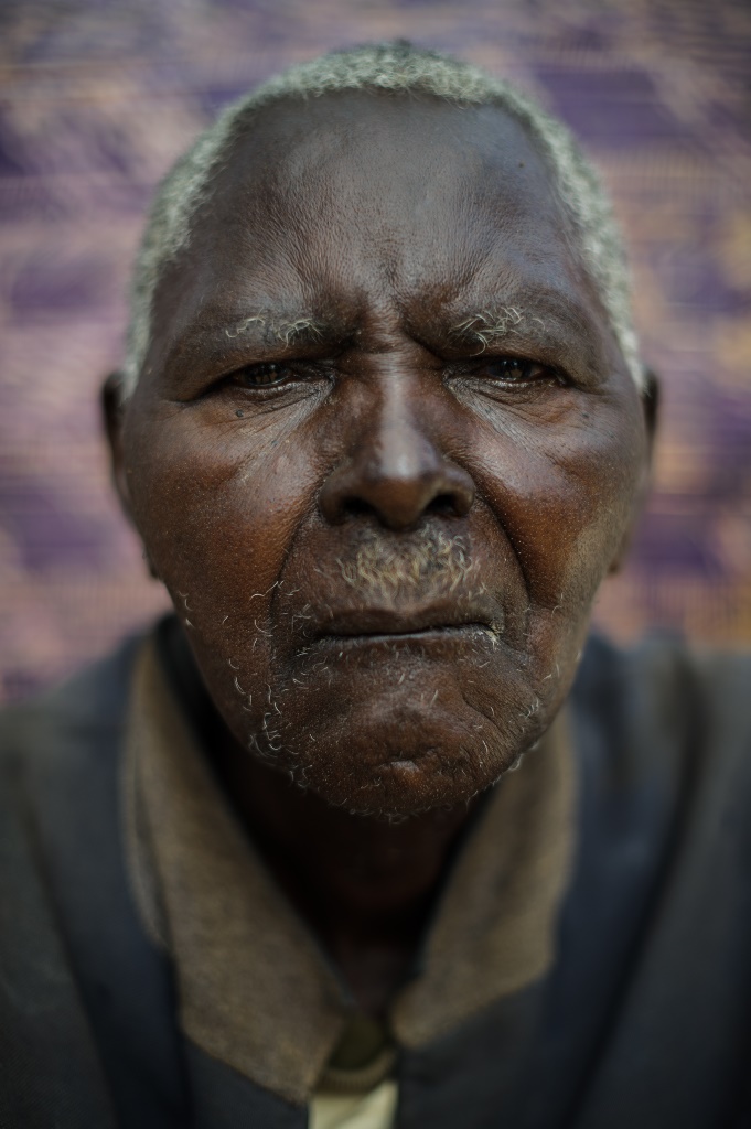 Kimweli Mbithuka Kilatya was arrested in 1952 in December. He was interrogated, beaten up and castrated [Phil Moore/Al Jazeera]