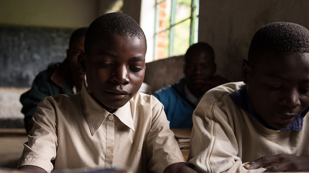 
Widen Bell, 12, says that in Ujamaa classes he found his 'source of strength' - his voice. He and other boys say they have stopped the rape of girls just by shouting [Hannah McNeish/Al Jazeera]
