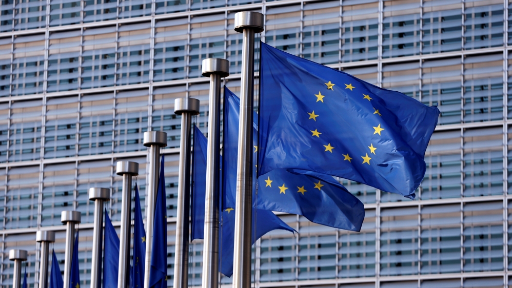 European Union flags flutter outside the EU Commission headquarters in Brussels, Belgium [REUTERS]