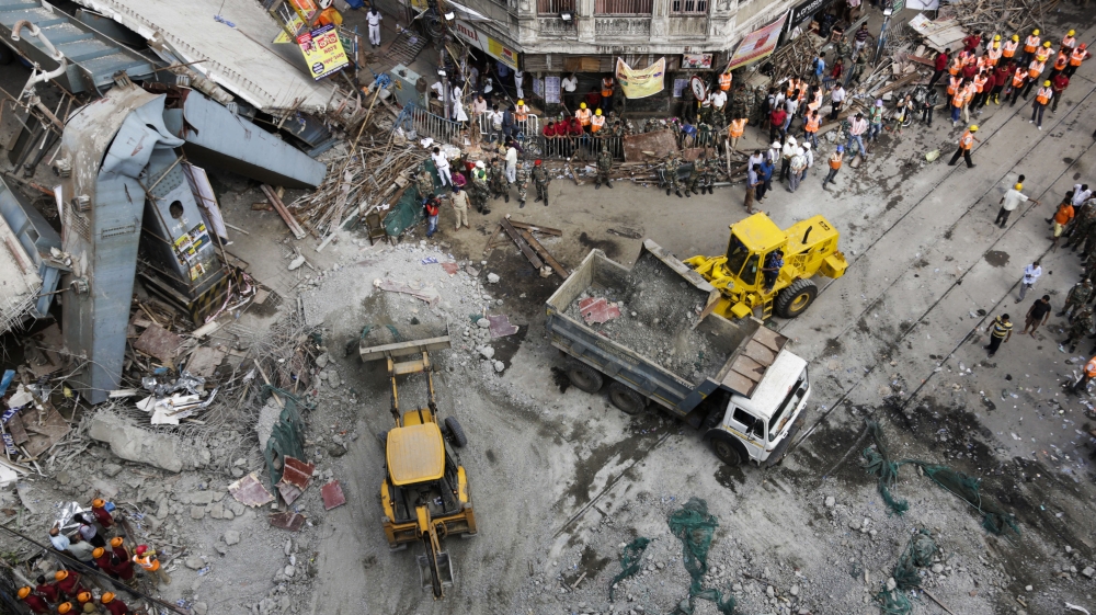 The overpass spanned nearly the width of the street and was designed to ease traffic through the crowded Bara Bazaar neighborhood [AP]