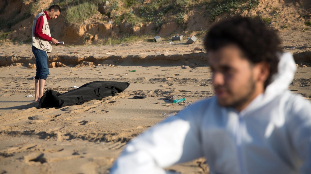 Drowned refugees at coast of Libya