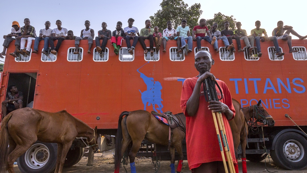 Spectators watch a match [Andrew Esiebo/Al Jazeera] 