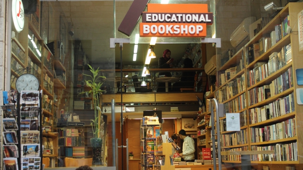 The mission of the bookstore is to reinforce the Palestinian culture and identity, says Muna [Urvashi Sarkar/Al Jazeera