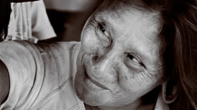 An indigenous Huaorani woman in the Ecuadorian Amazon [Amelia Opalinska /Al Jazeera]