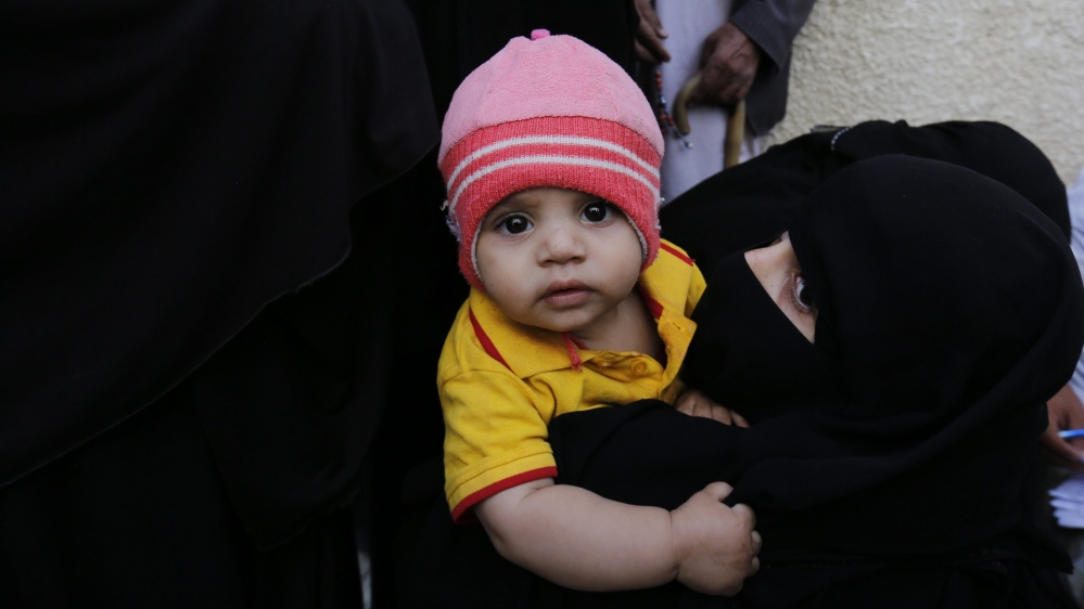 Conflict-affected Yemenis receive food rations on first day of Ramadan