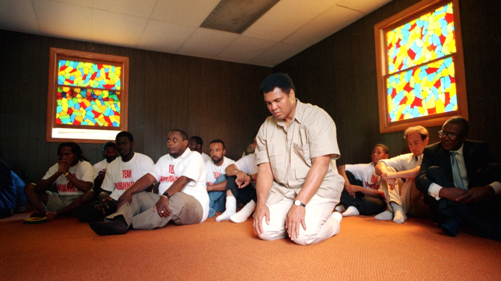 Muhammad Ali praying