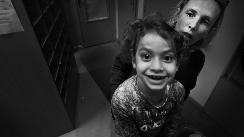 Tema is the best Dutch speaker in the house [Mona van den Berg/Al Jazeera] 