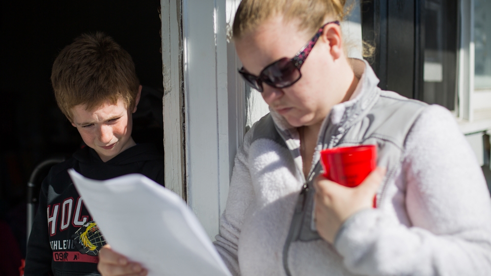 Tiffany checks Colby's homework, telling him to 