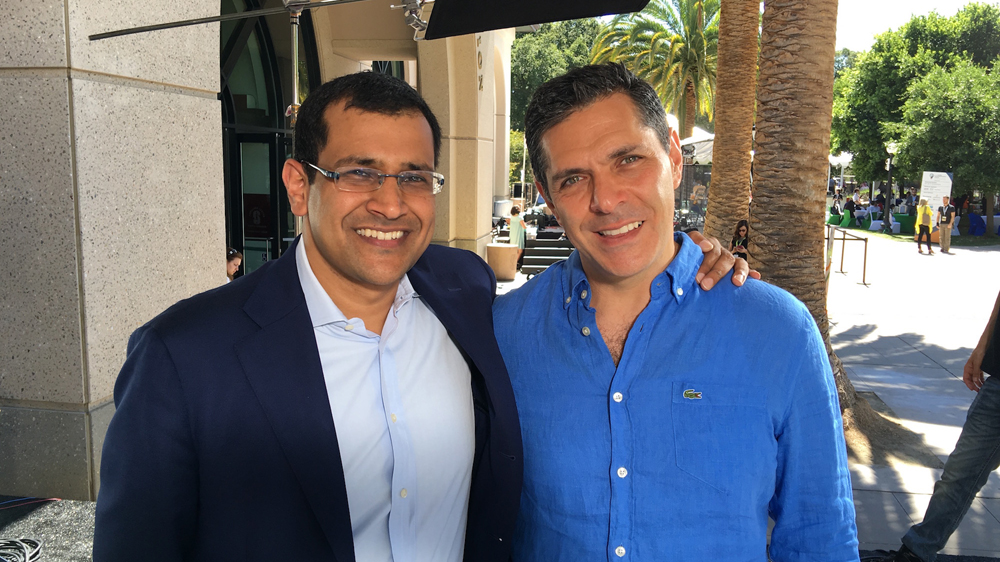 Kamahl Santamaria (left) and entrepreneur Daniel Lubetzky at the Global Entrepreneurship Summit 2016 [Al Jazeera]
