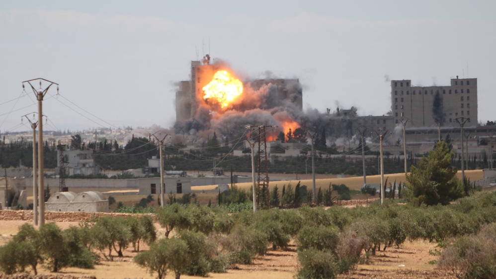 Smoke and flame rise after what fighters of the Syria Democratic Forces said were US-led air strikes on the mills of Manbij where ISIL are positioned, in Aleppo [REUTERS]